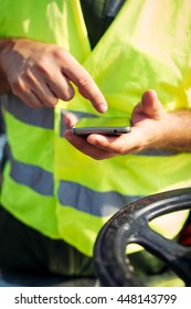 Oil Worker Using Smart Phone