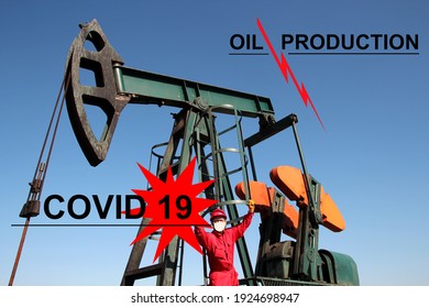 Oil Worker Wearing Antivirus Mask In An Oil Field Points To The Covid 19 Sign. Crude Oil Production Declines Due To Coronavirus