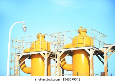 Oilfield equipment, oil field landscape - Shutterstock ID 1348599542