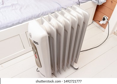 Oil-filled Electrical Mobile Radiator Heater For Home Heating And Comfort Control In The Room.