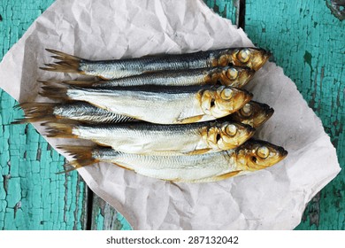 Oily Fish Is Smoked On Paper