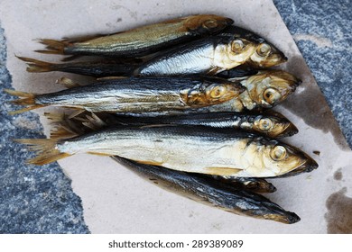 Oily Fish Is Smoked On Paper