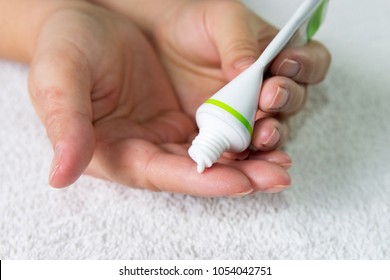 Ointment On Hand. Applying The Ointment  In The Treatment And Hydration Of The Skin .