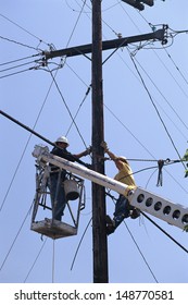 OJAI, CALIFORNIA - CIRCA 1980's: Cable TV Linemen At Work In Ojai, CA