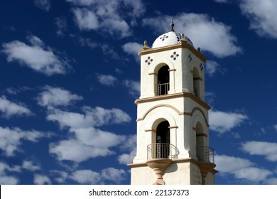The Ojai post office tower with a nice blue sky and clouds