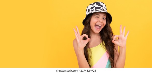 Ok Gesture. Childhood Happiness. Summer Party Look. Happy Funny Kid In Bucket Hat. Child Face, Horizontal Poster, Teenager Girl Isolated Portrait, Banner With Copy Space.