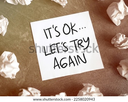 Its OK lets try again, text words typography written on paper, life and business motivational inspirational concept
