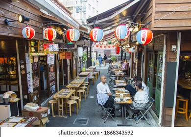 Okinawa streets ,Okinawa, Japan -April 19 ,2018:Many tourists eat at restaurants in the streets of Okinawa