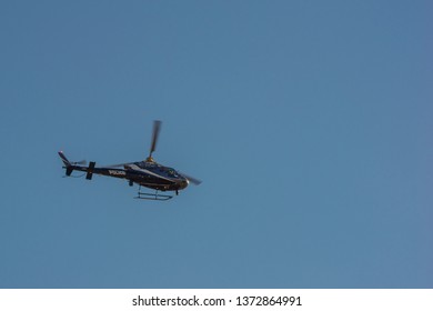 Oklahoma City, OK / USA - April 4, 2019

Oklahoma City Police Helicopter Flies Overhead In Clear Blue Skies. 