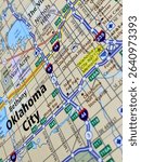 Oklahoma City, Oklahoma, USA, a photo of a map in a world atlas, suitable to illustrate travel, tourism, trade, economy and politics topics