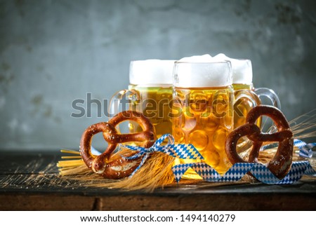 Oktoberfest beer with bavarian pretzels and obatzter Dip chesse cream