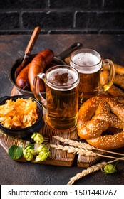 Oktoberfest Concept. Beer, Pretzels And Traditional Bavarian Food