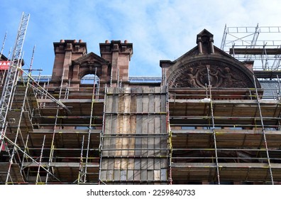 Old 19th Century Stone Commercial Building with Scaffolding   - Shutterstock ID 2259840733