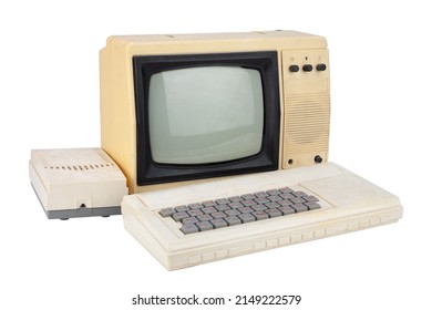 old 8 bit computer with monitor from tv set isolated on white