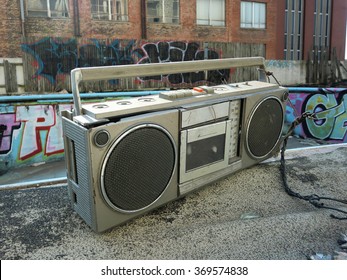 Old 80's Boom Box Stereo By An Abandoned Pool - Landscape Photo