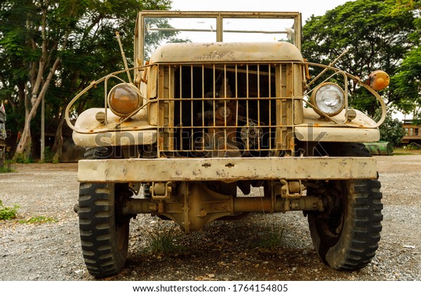Old, abandoned\
army vehicle during world war\
2.