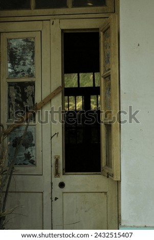 old abandoned building old door window yellow