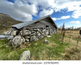 Old and abandoned building on a farm high in the mountains of Norway near Jotunheimen