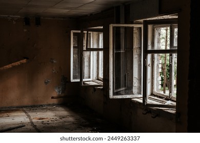 Old abandoned building. Old windows. Abandoned hotel. Peeling walls of the room. Horror concept. - Powered by Shutterstock