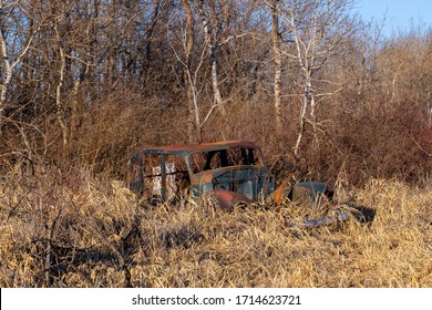 A Old Abandoned Car In A Farm Feild Near Saskatoon, Saskatachewan Canada