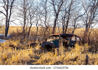 A Old Abandoned Car In A Farm Feild Near Saskatoon, Saskatachewan Canada