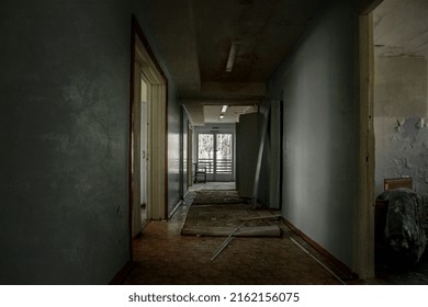 An Old Abandoned Corridor In A Pioneer Camp. Light From Doorways. Shabby Walls. Forgotten Place.