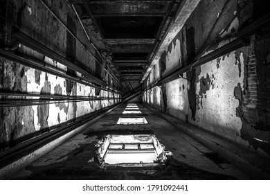 Old abandoned elevator shaft in black and white.  - Powered by Shutterstock