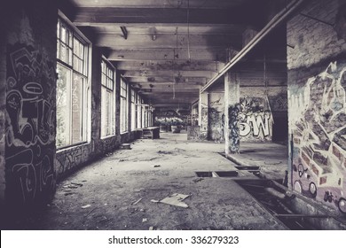 Old abandoned factory hall and graffiti - Powered by Shutterstock