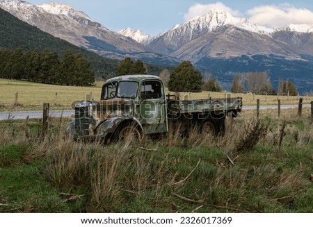 An Old Abandoned Green Truck