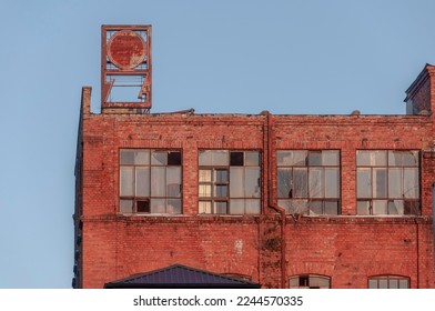 Old abandoned haunted red brick factory of stockings, pantyhose and socks in Central Europe, Poland - Powered by Shutterstock