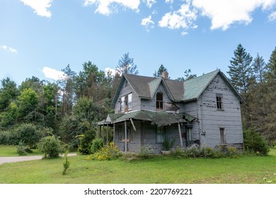 An Old Abandoned Home Sits Crumbling And Rotting Away In A Rural Area On St. Joseph Island In Ontario.