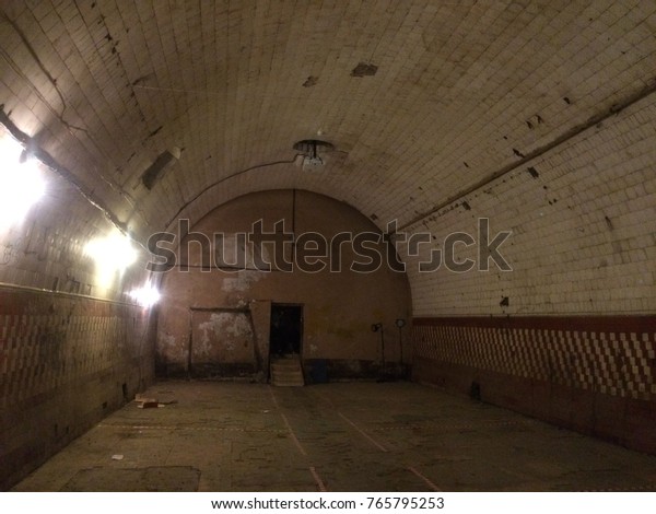 Old Abandoned Lowlighted Building Vaulted Ceilings Stock Photo