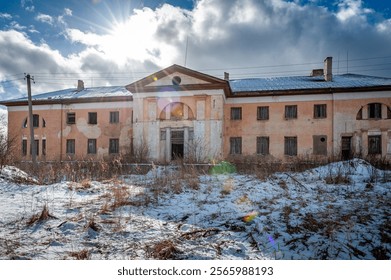 An old abandoned manor house in a classic style. View from the courtyard. Pilsblidene manor, Blidene, Latvia. - Powered by Shutterstock