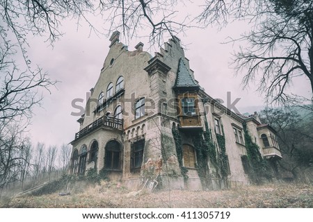 Old abandoned mansion in mystic spooky forest