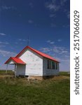 Old abandoned one room school house in the prairie