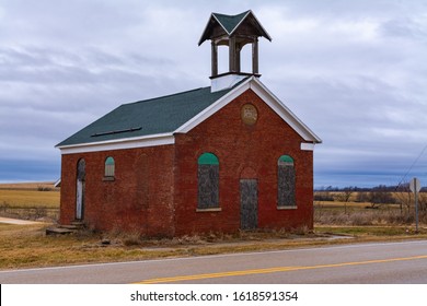 Old Abandoned One-room Brick Schoolhouse In The Midwest.