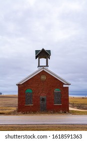 Old Abandoned One-room Brick Schoolhouse In The Midwest.