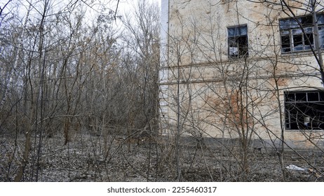 old abandoned premises, ruin. empty territories, abandoned houses. concept of war, Chernobyl disaster, apocalypse. brick buildings. sad view, heavy atmosphere. desolation and destruction of the abode - Shutterstock ID 2255460317