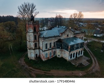 Old Abandoned Ruined Mansion In Gothic Style With Stained Glass Windows In Avchurino, Aerial View