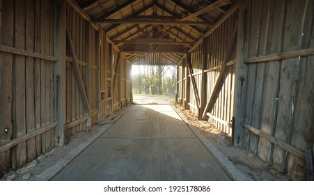 An old abandoned rustic wooden shed, close-up. Agriculture, farm industry, traditional architecture, USA, Wild West, history, gold mine, western, zombie, horror and other graphic resources concepts