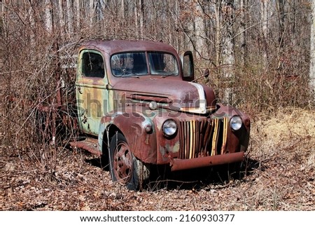 Old abandoned rusty Flatbed Truck