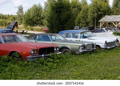 Old abandoned rusty vehicles, crushed cars in junkyard. Cars recycling concept. - Shutterstock ID 2037141416