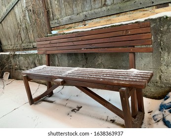 
Old Abandoned Snowy Park Bench