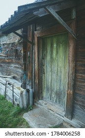 An Old Abandoned Wooden Building In A Village Manor.