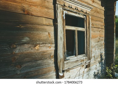 An Old Abandoned Wooden Building In A Village Manor.