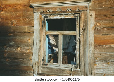 An Old Abandoned Wooden Building In A Village Manor.