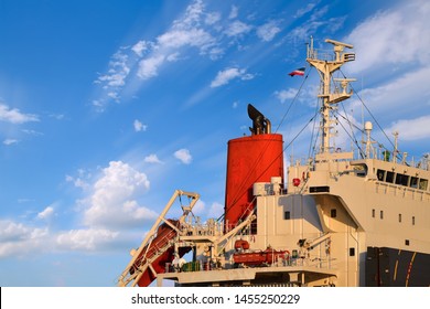 Old accommodation bridge deck of cargo ship and navigation with mast radio, radar for communication during ship moored in floating dry dock for maintenance under ship Repairing in shipyard.