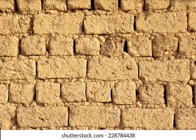 Old adobe wall closeup in sunny day  - Powered by Shutterstock