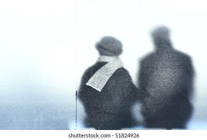 Old Age - Old Couple Sitting In A Bus Stop