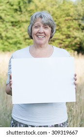 Old Age Woman Holding Blank Sign